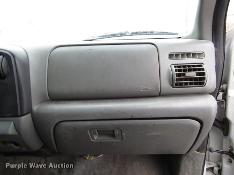 image for item DD3825 2007 Ford F350 Super Duty Crew Cab flatbed pickup truck