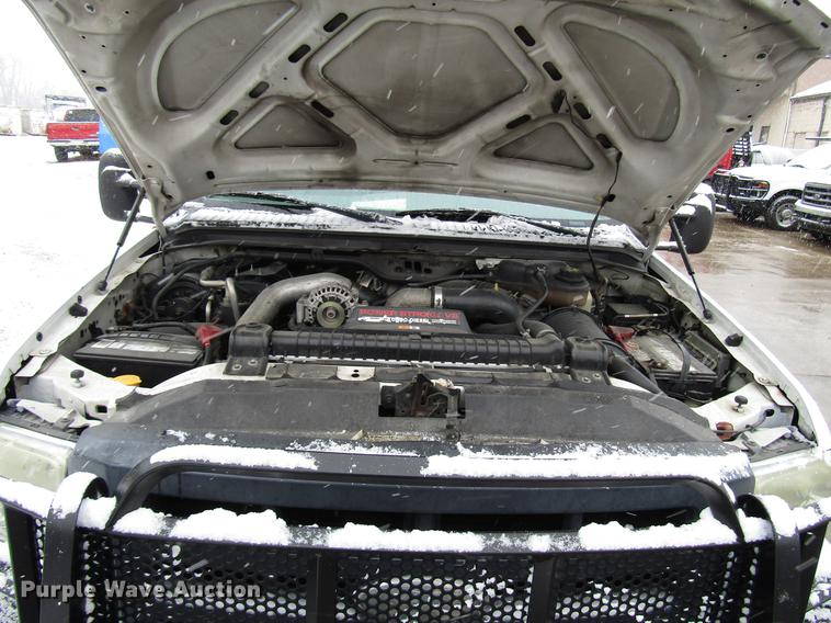 image for item DD3825 2007 Ford F350 Super Duty Crew Cab flatbed pickup truck