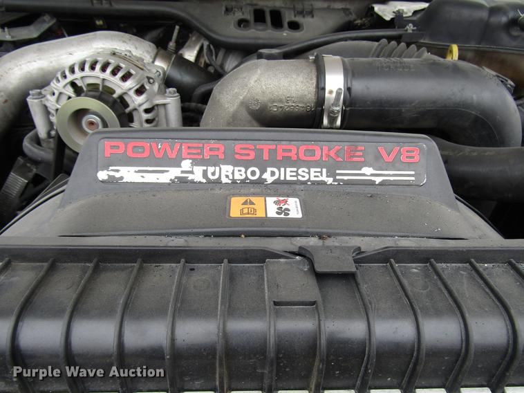 image for item DD3825 2007 Ford F350 Super Duty Crew Cab flatbed pickup truck