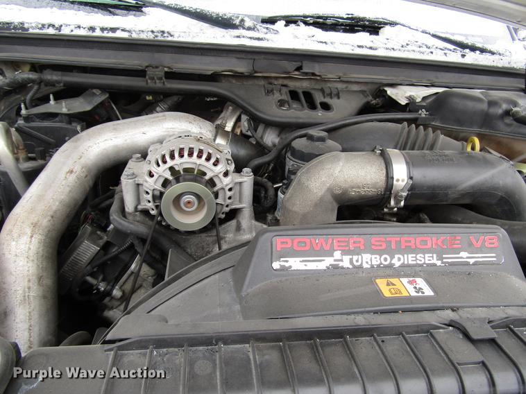 image for item DD3825 2007 Ford F350 Super Duty Crew Cab flatbed pickup truck