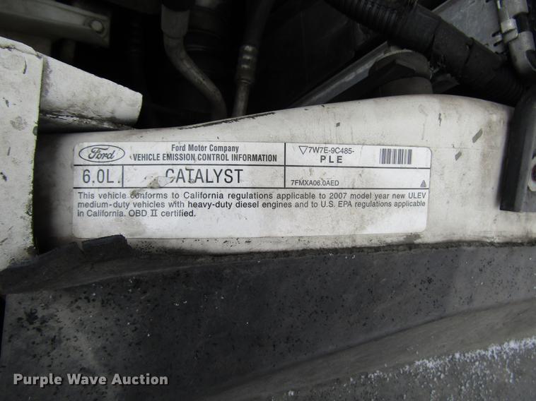 image for item DD3825 2007 Ford F350 Super Duty Crew Cab flatbed pickup truck