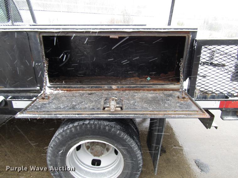 image for item DD3825 2007 Ford F350 Super Duty Crew Cab flatbed pickup truck