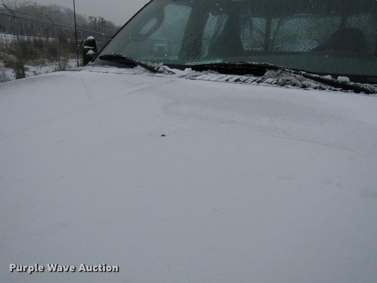 image for item DD3825 2007 Ford F350 Super Duty Crew Cab flatbed pickup truck