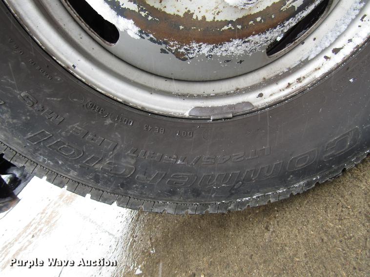 image for item DD3825 2007 Ford F350 Super Duty Crew Cab flatbed pickup truck