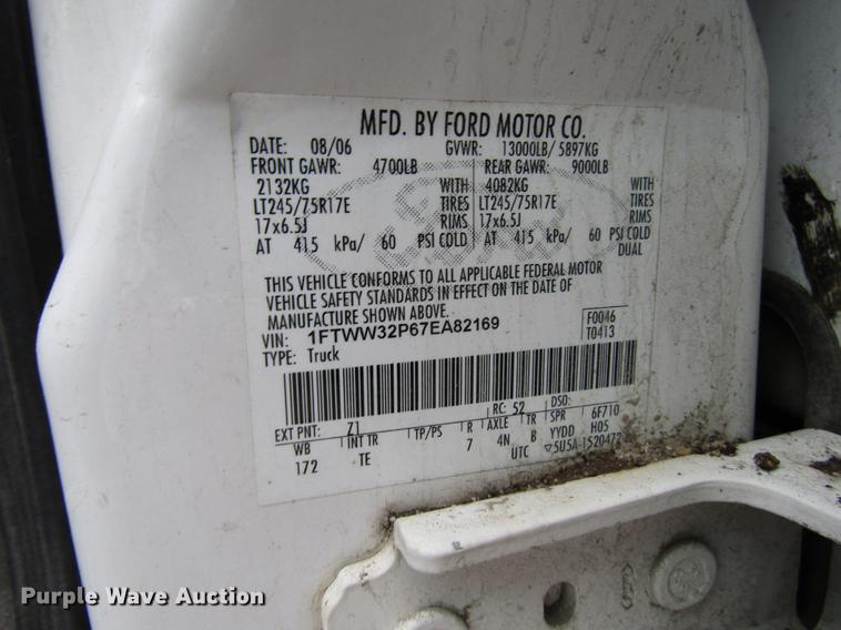 image for item DD3825 2007 Ford F350 Super Duty Crew Cab flatbed pickup truck