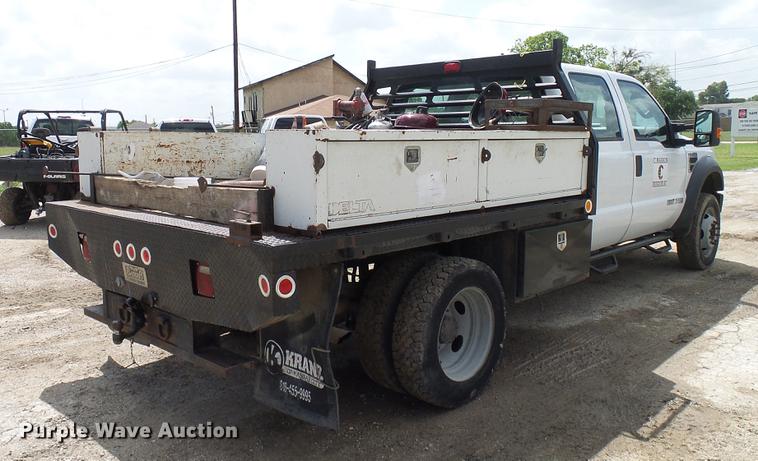 image for item DD8327 2008 Ford F450 Super Duty Crew Cab flatbed truck