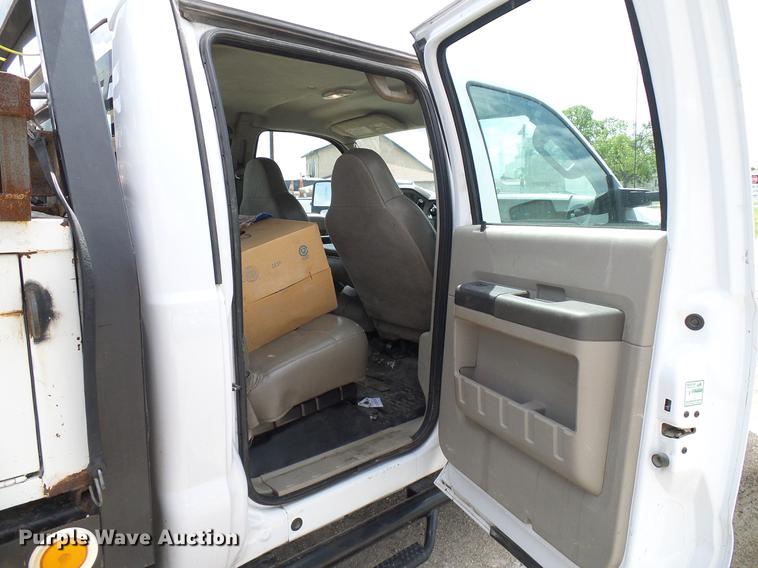 image for item DD8327 2008 Ford F450 Super Duty Crew Cab flatbed truck