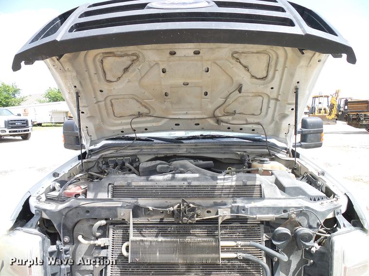 image for item DD8327 2008 Ford F450 Super Duty Crew Cab flatbed truck