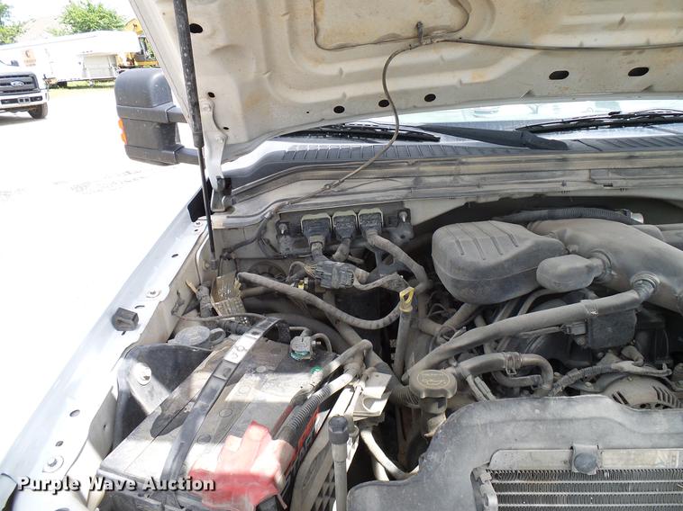 image for item DD8327 2008 Ford F450 Super Duty Crew Cab flatbed truck