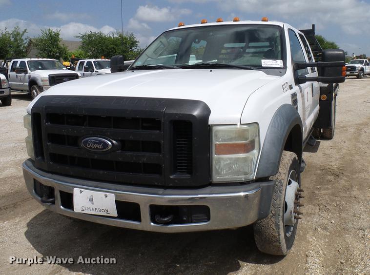 image for item DD8327 2008 Ford F450 Super Duty Crew Cab flatbed truck