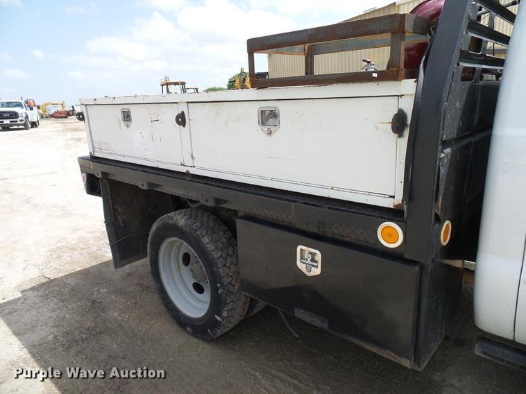 image for item DD8327 2008 Ford F450 Super Duty Crew Cab flatbed truck