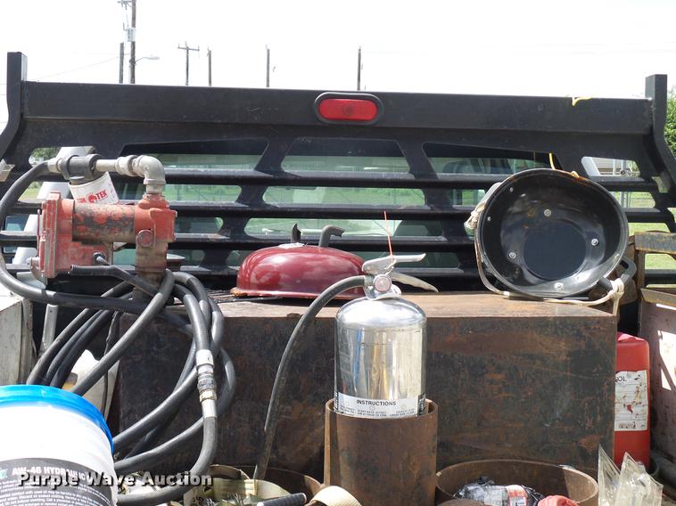 image for item DD8327 2008 Ford F450 Super Duty Crew Cab flatbed truck