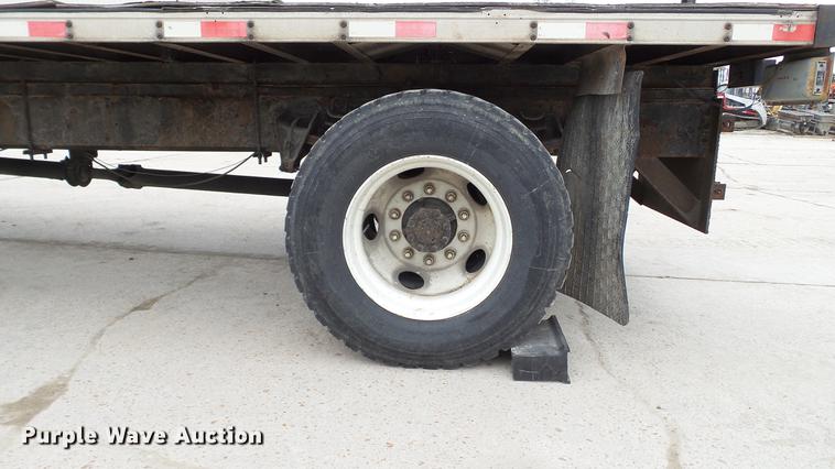 image for item DE4986 1998 International 4700 flatbed truck