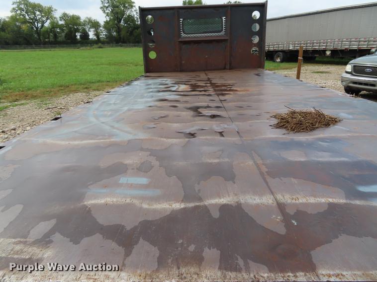 image for item EI9985 1993 Isuzu NPR dump flatbed truck