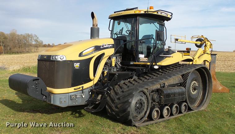 image for item DA3588 2009 Challenger MT865C tractor with tile plow