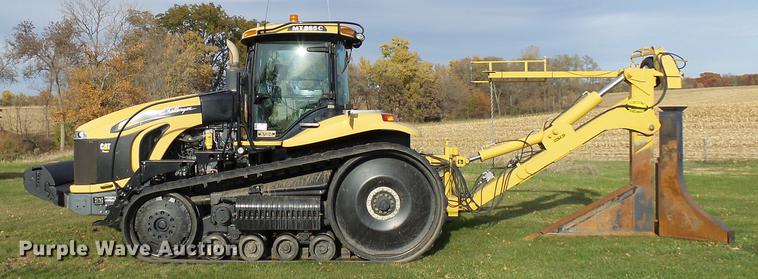 image for item DA3588 2009 Challenger MT865C tractor with tile plow