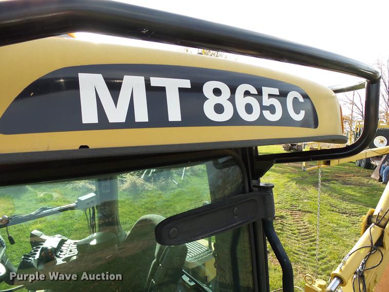 image for item DA3588 2009 Challenger MT865C tractor with tile plow