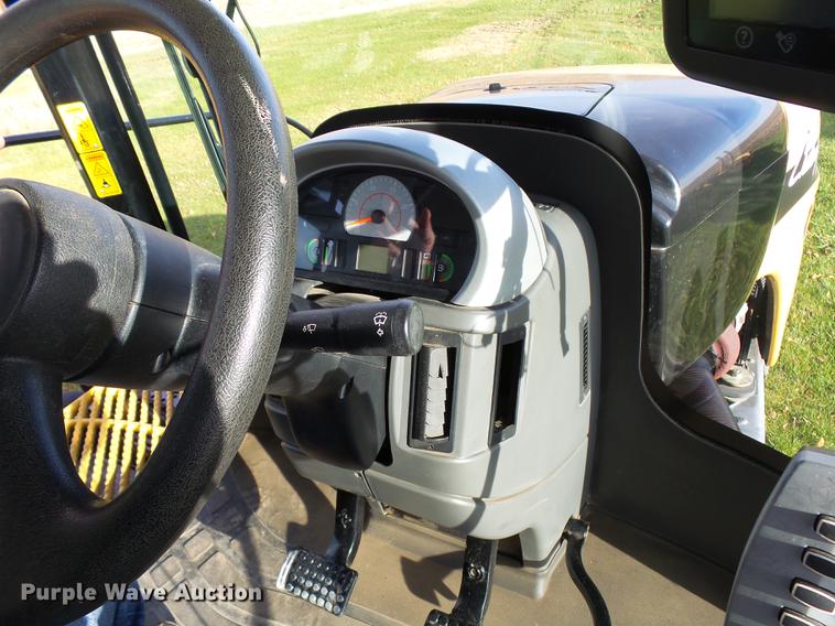 image for item DA3588 2009 Challenger MT865C tractor with tile plow