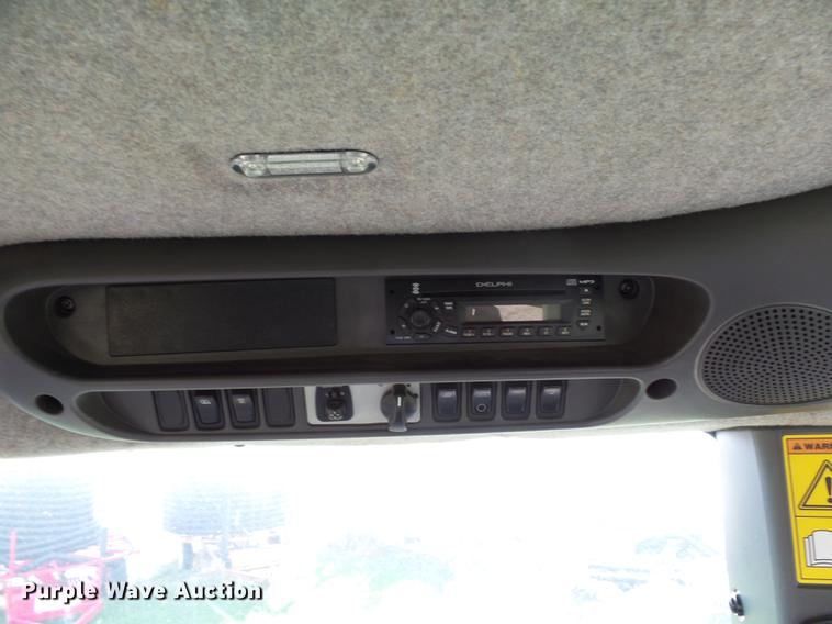 image for item DA3588 2009 Challenger MT865C tractor with tile plow