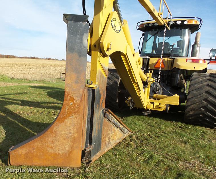 image for item DA3588 2009 Challenger MT865C tractor with tile plow