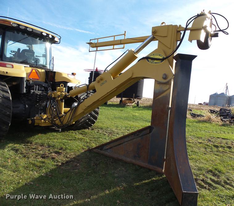 image for item DA3588 2009 Challenger MT865C tractor with tile plow