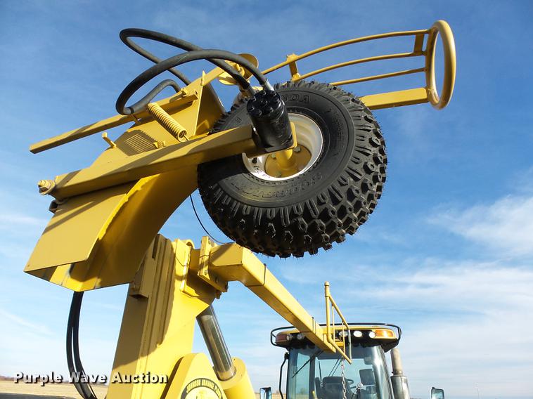 image for item DA3588 2009 Challenger MT865C tractor with tile plow