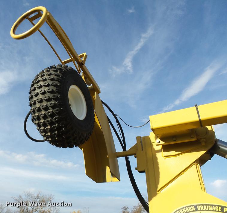 image for item DA3588 2009 Challenger MT865C tractor with tile plow