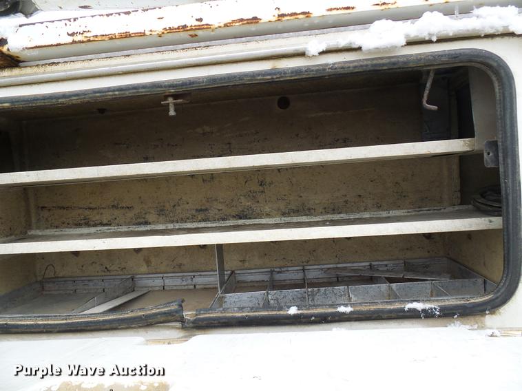 image for item DB2059 2001 Freightliner FL70 digger derrick truck