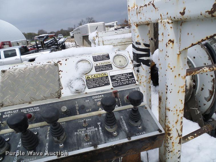 image for item DB2059 2001 Freightliner FL70 digger derrick truck