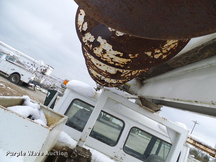 image for item DB2059 2001 Freightliner FL70 digger derrick truck