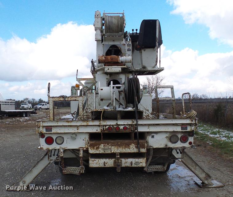 image for item DB2066 1997 International 4700 digger derrick truck