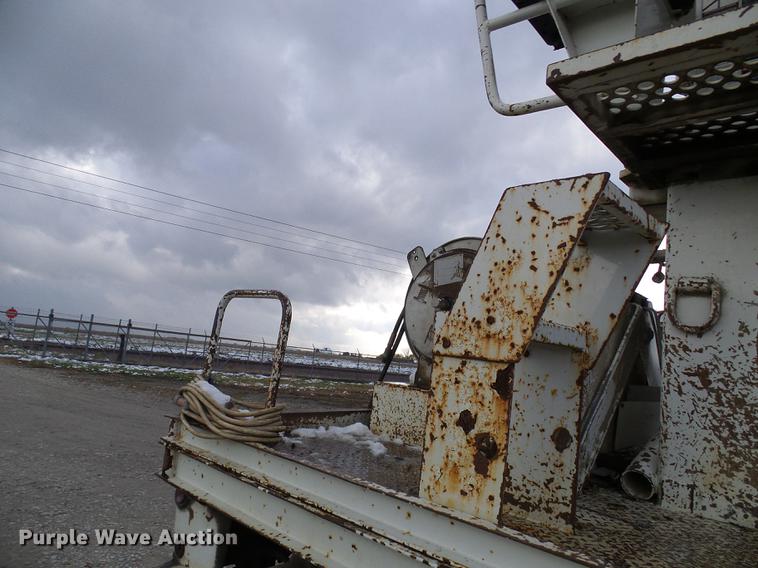 image for item DB2066 1997 International 4700 digger derrick truck