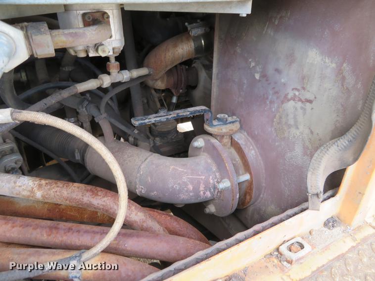 image for item DE6543 Case 220B excavator