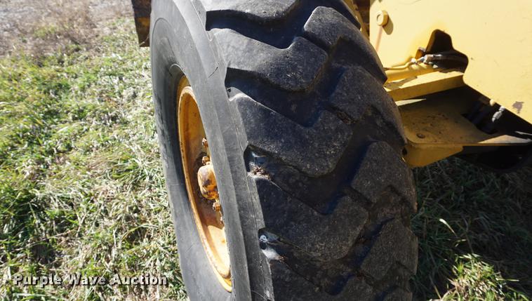 image for item DF1590 John Deere 570 motor grader