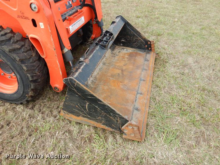image for item DF2063 2017 Kubota SSV65 skid steer