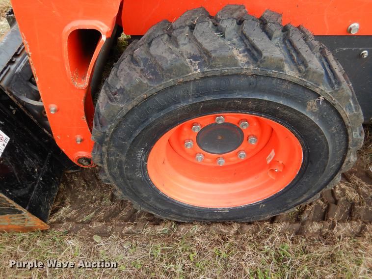 image for item DF2063 2017 Kubota SSV65 skid steer
