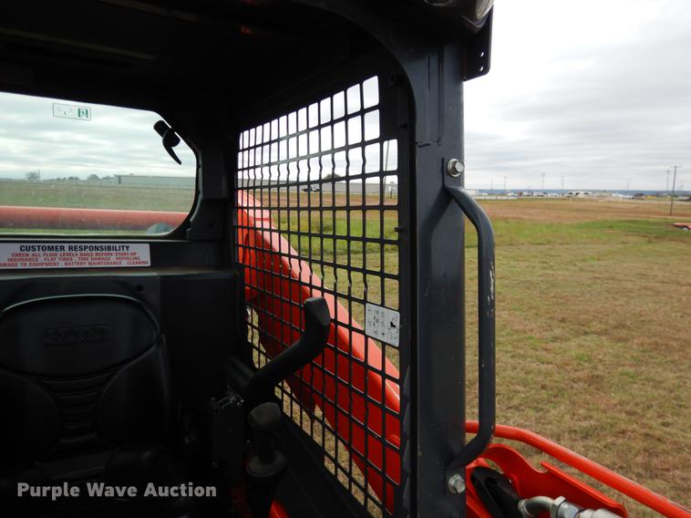 image for item DF2064 2016 Kubota SSV65 skid steer
