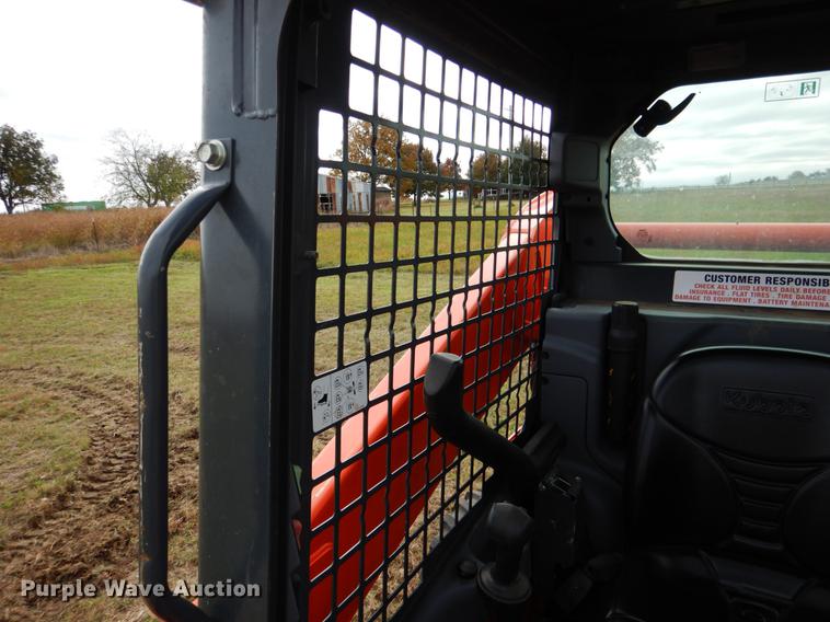 image for item DF2064 2016 Kubota SSV65 skid steer