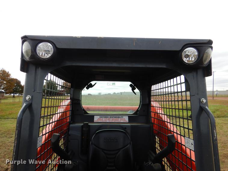 image for item DF2064 2016 Kubota SSV65 skid steer