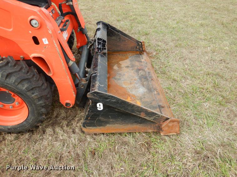 image for item DF2064 2016 Kubota SSV65 skid steer