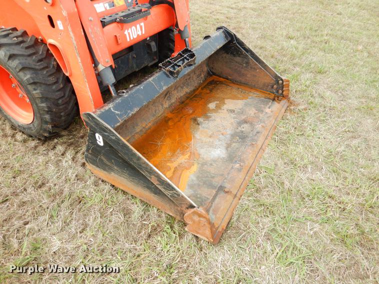 image for item DF2064 2016 Kubota SSV65 skid steer