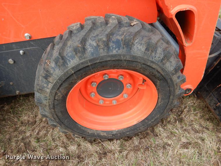 image for item DF2064 2016 Kubota SSV65 skid steer