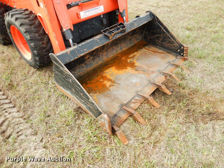 image for item DF2092 2017 Kubota SSV65 skid steer