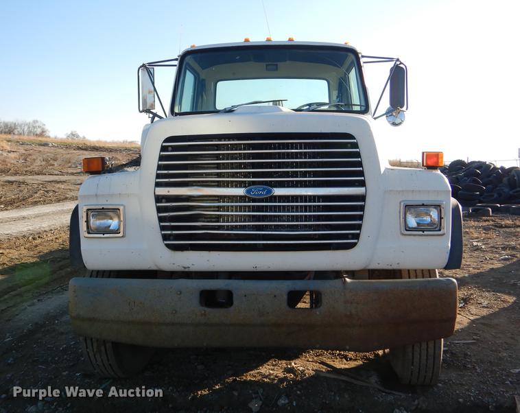 image for item DD8950 1997 Ford LT9000 rollback truck