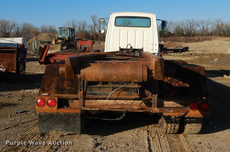 image for item DD8950 1997 Ford LT9000 rollback truck