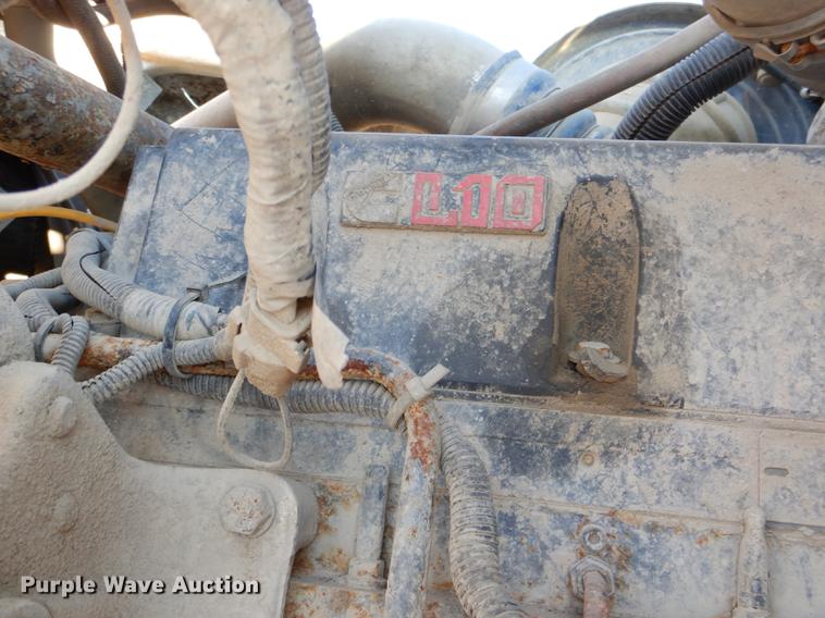 image for item DD8950 1997 Ford LT9000 rollback truck