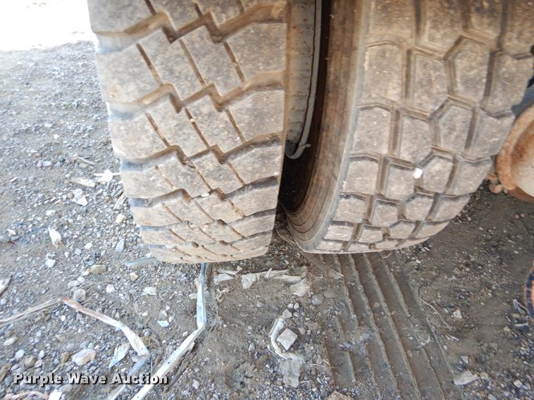 image for item DD8950 1997 Ford LT9000 rollback truck