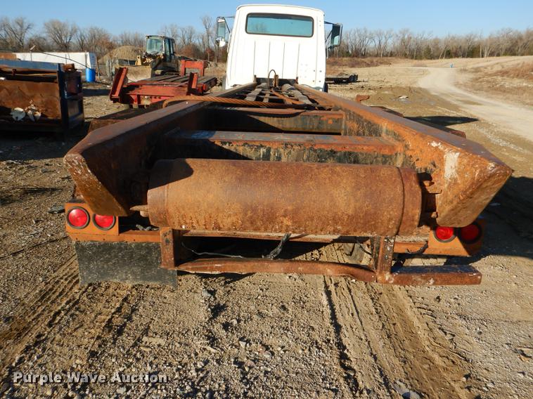 image for item DD8950 1997 Ford LT9000 rollback truck