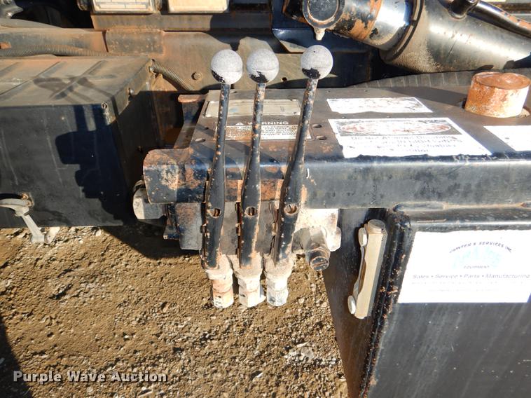 image for item DD8950 1997 Ford LT9000 rollback truck