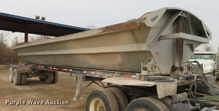 image for item DE5031 1999 Smithco side dump trailer